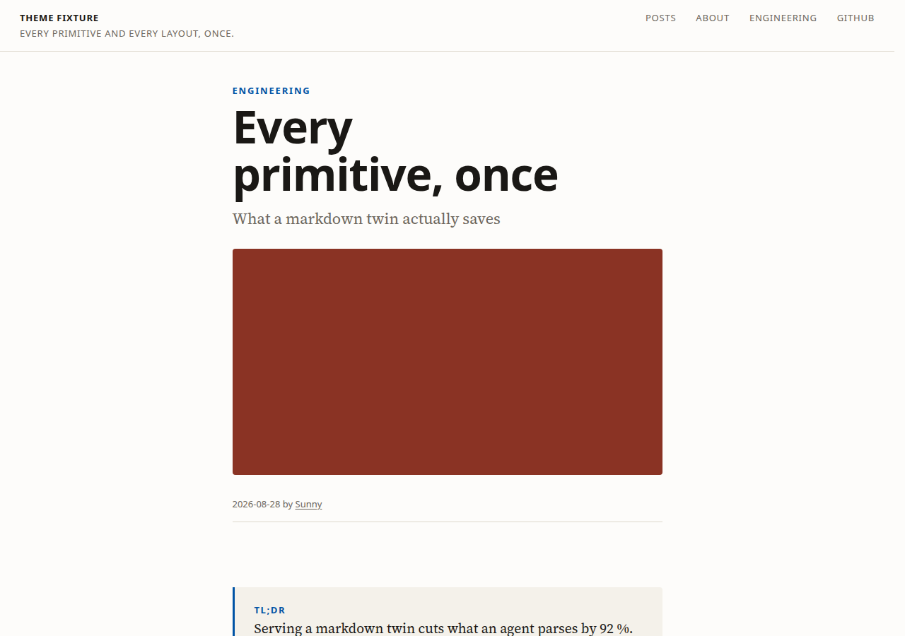 The editorial theme in its broadsheet look: a wider column, a sans-serif headline, tighter leading, a press-blue category label
